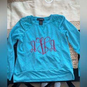 Custom AVA embroidered sweatshirt .